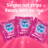 SKINS condoms packaging on a pink background with text 'Singles not strips, Ready with no rips'.