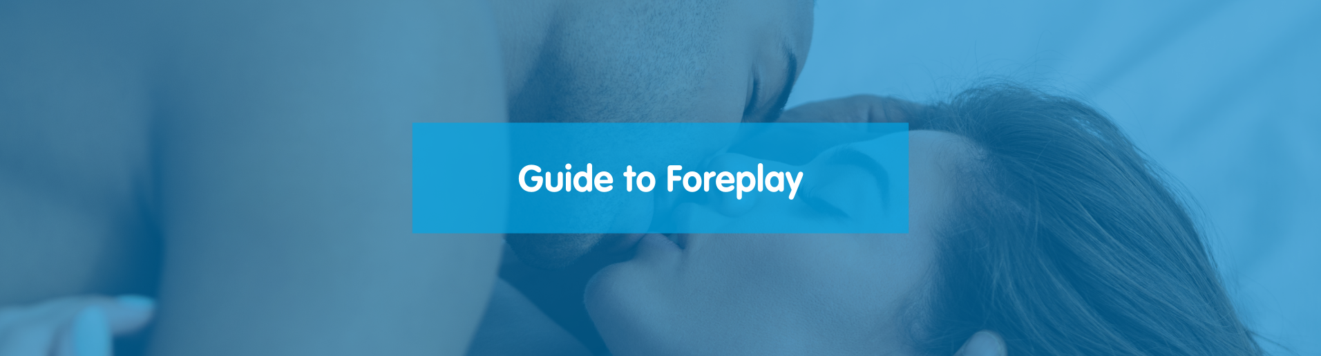 Guide to Foreplay banner shows a straight couple kissing while laid in bed