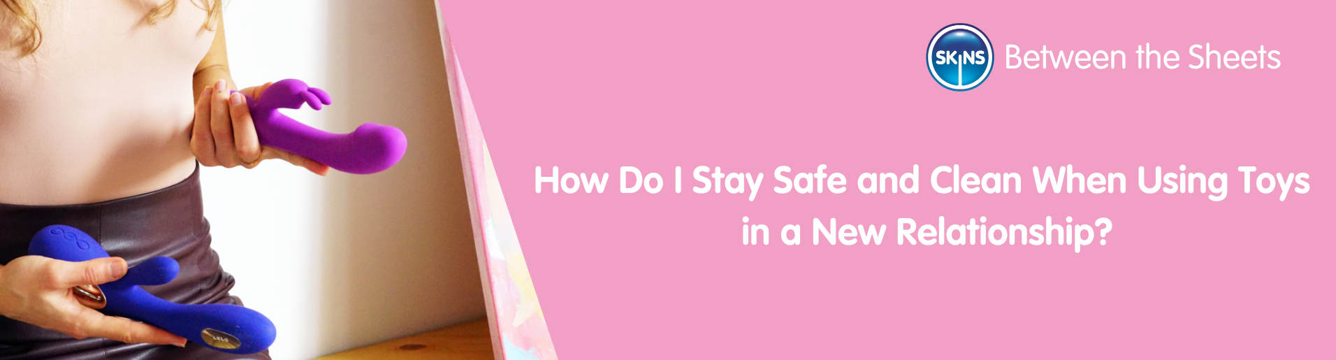 A woman holding two rabbit vibrators in her hand. One purple and the other blue