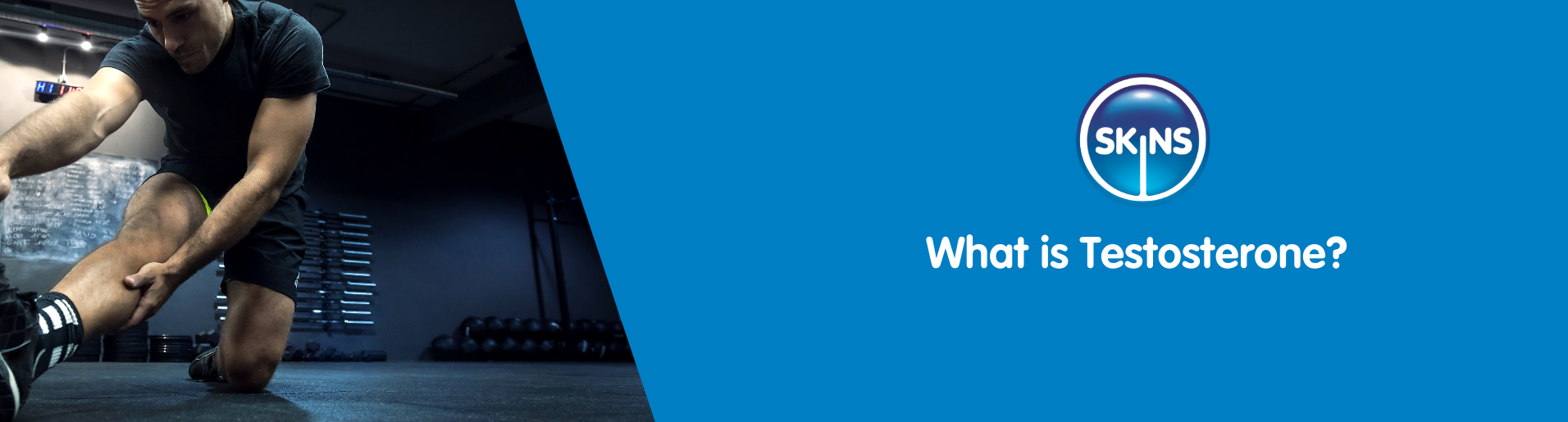 a man kneeling and stretching his legs while in the gym