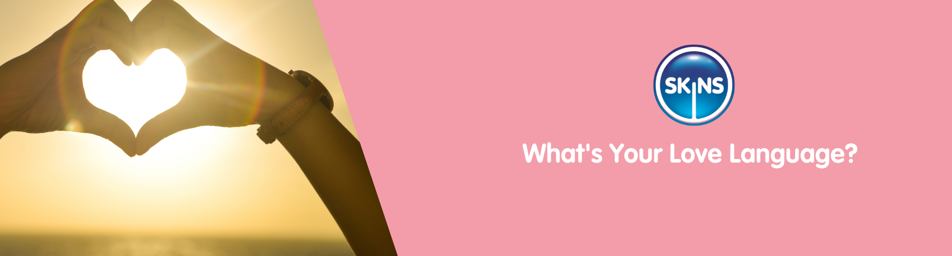 Human hands in the shape of a heart over the sun