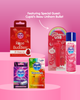 Collection of SKINS products including 'Rose Buddies', 'Unicorn USB', and 'Vibe Ring' on a pink background.