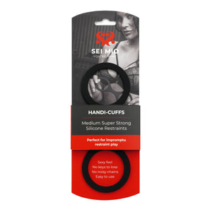 Packaging of SEI MIG handi-cuffs with a woman's face on a white background