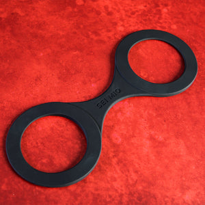 Black metal tool with 'SEIMIO' branding on a red textured background