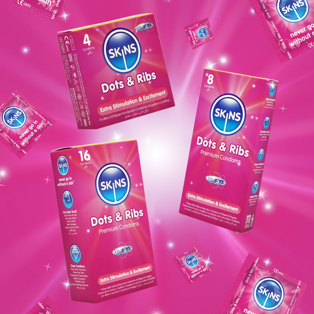 SKINS Dots & Ribs condoms packaging on a pink background