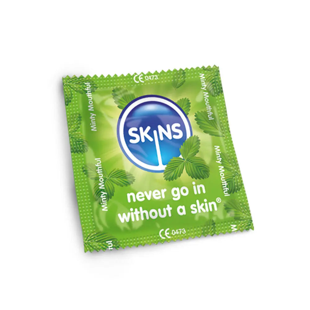 Green packet of Skins with minty flavor on a white background
