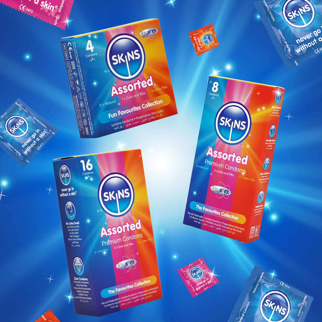 SKINS assorted condoms packaging on a blue background
