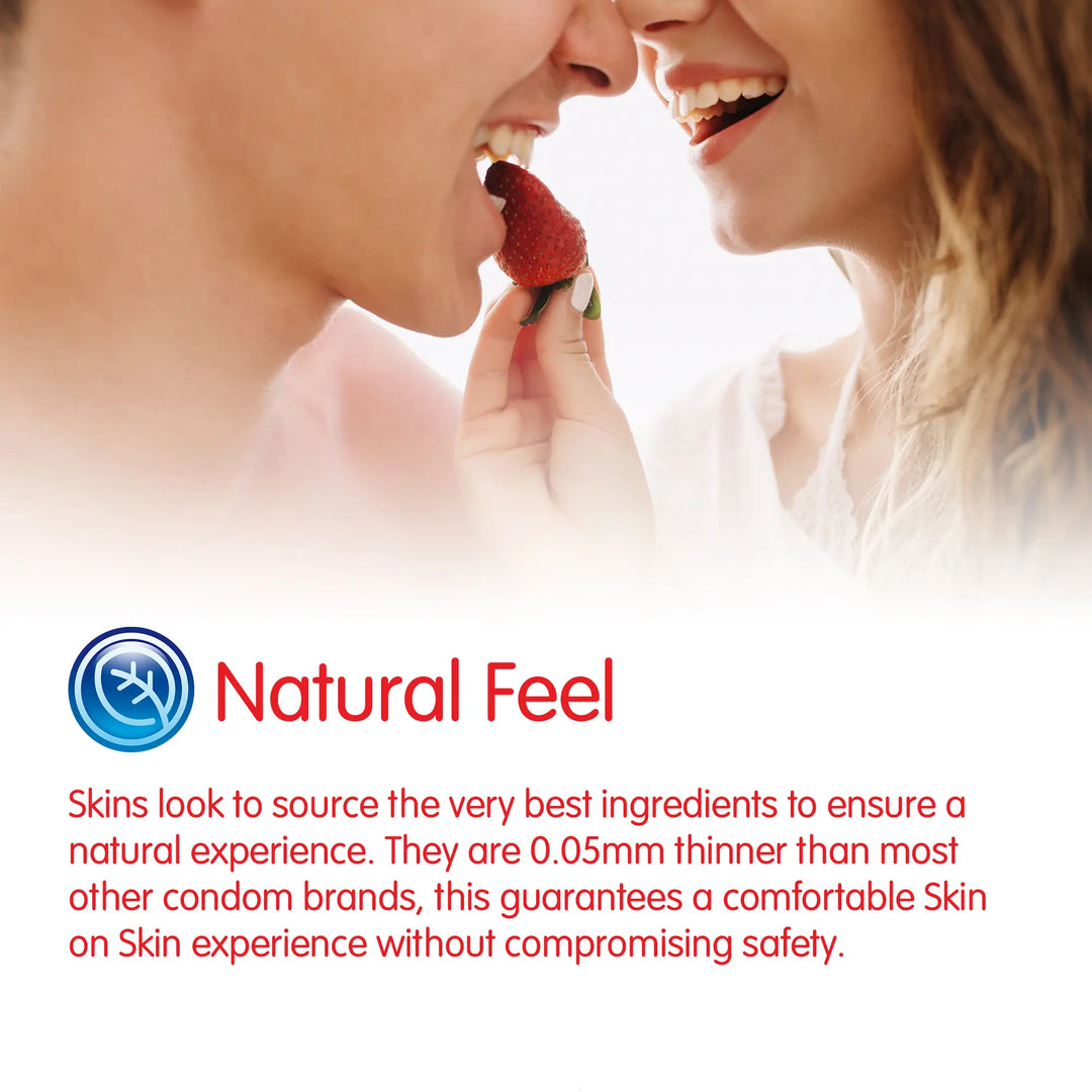Advertisement for 'Natural Feel' condoms with a close-up of two people holding a strawberry.
