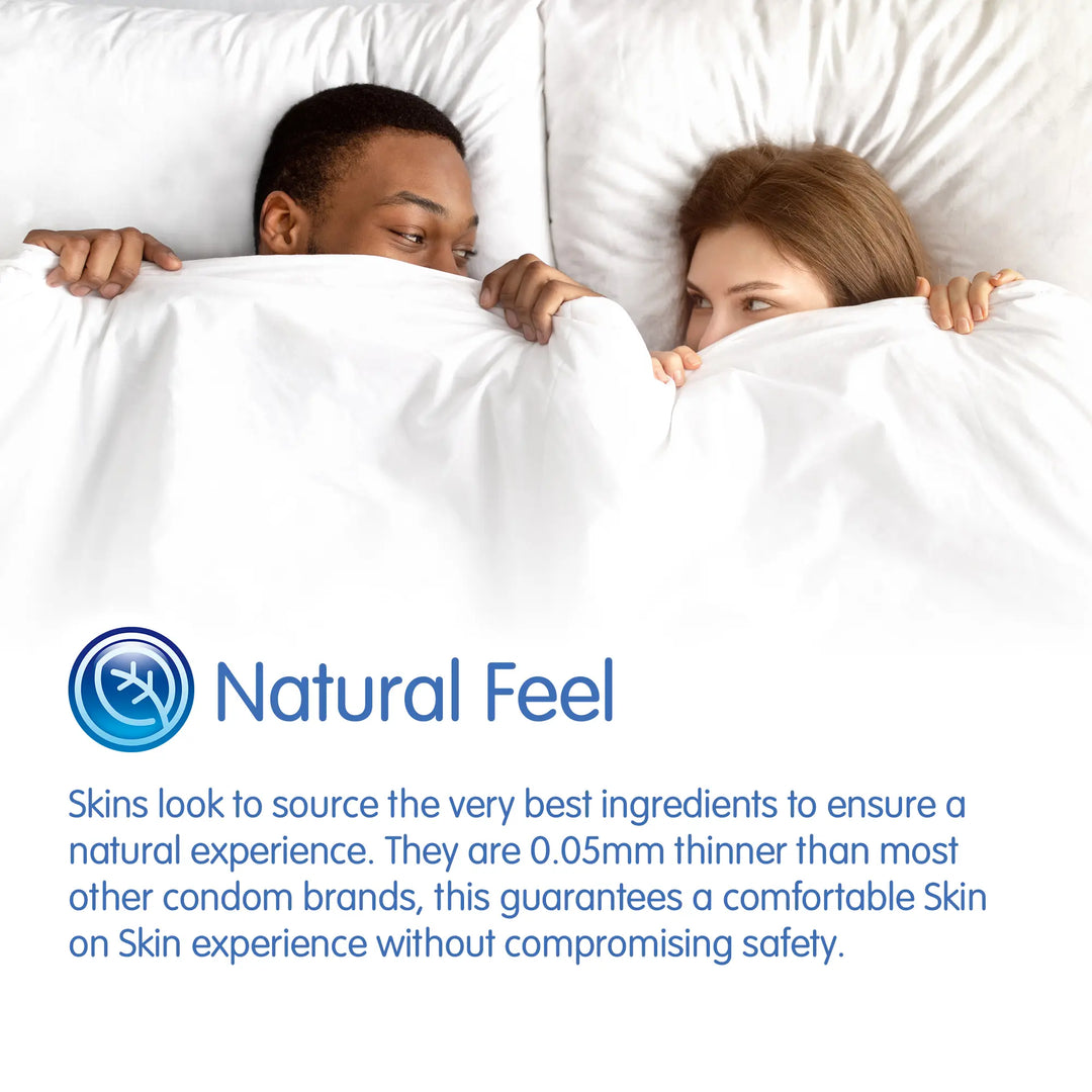 Two people lying in bed under white sheets with 'Natural Feel' branding and product description text.
