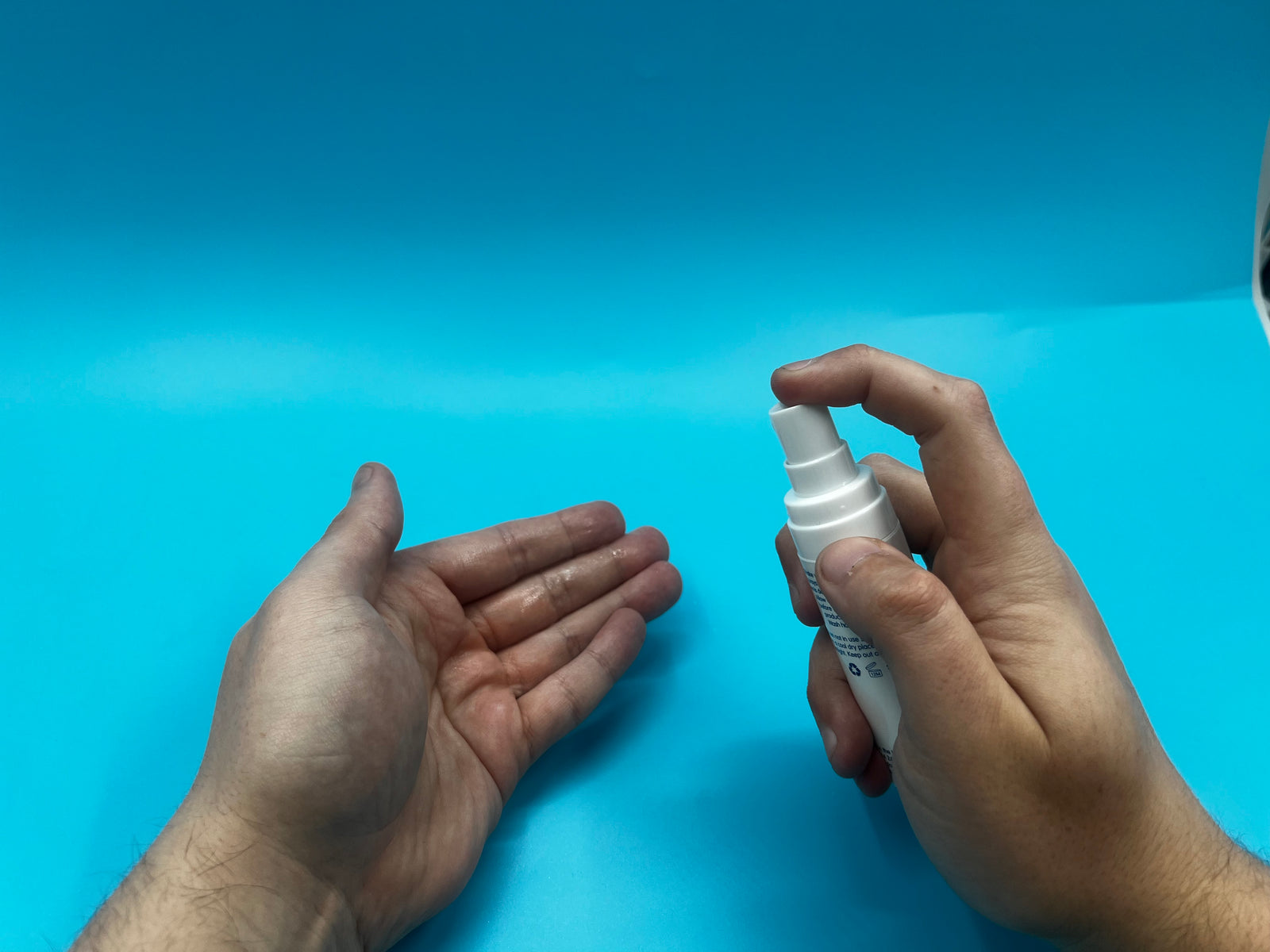 Spraying the formula in hands