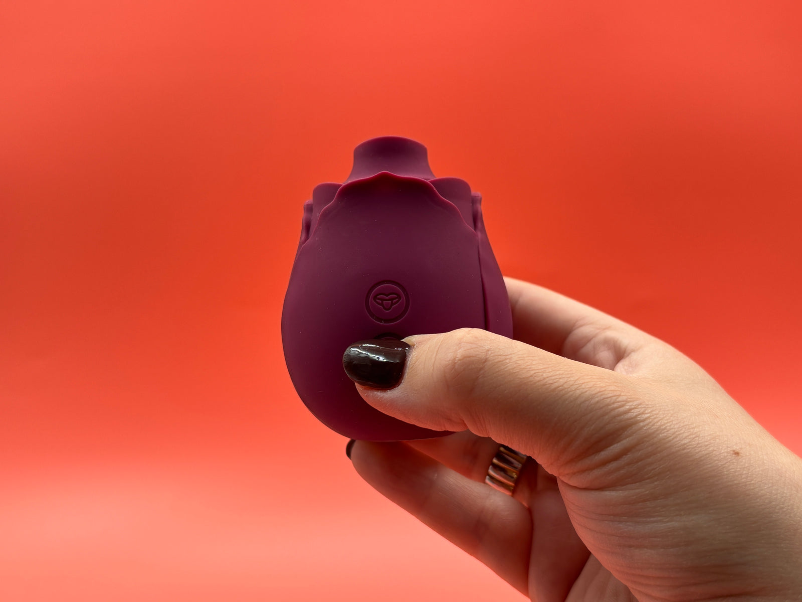 Pressing and holding the rose lix to turn on