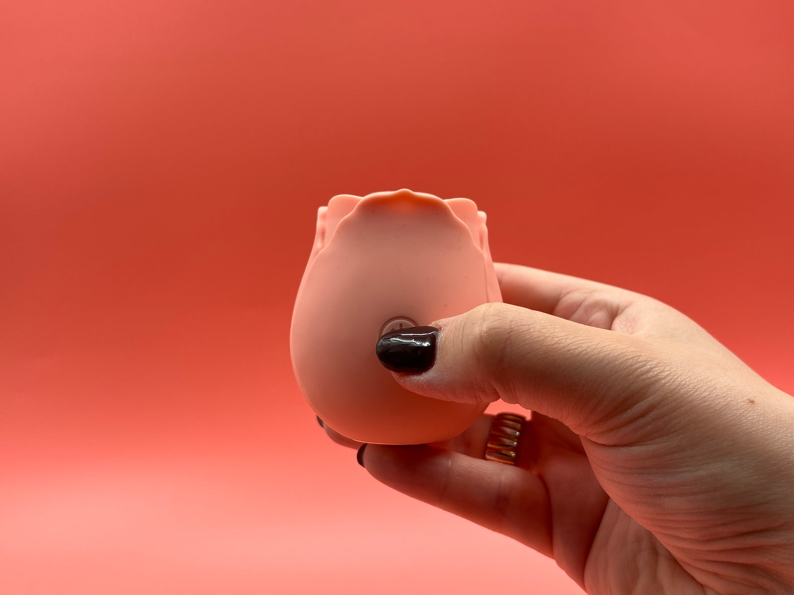 Pressing and holding the rose lix to turn on