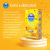 A bright yellow background with the heading "Extra Lubricated". Under this an explanation of why Skins condoms have extra lubrication. On the right, a box of 12 skins banana condoms stood on a short, white, circular platform. 