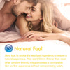 A couple in bed laying on their fronts touching noses. Below this, the heading "Natural Feel" with an explanation of why and how skins condoms have a natural feel. 