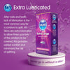 A bright purple background with the heading "Extra Lubricated" and an explanation of why skins condoms are extra lubricated. On the right a pack of 12 Extra Lubricated condoms stood on a white, circular stand with a lube splash in the background. 