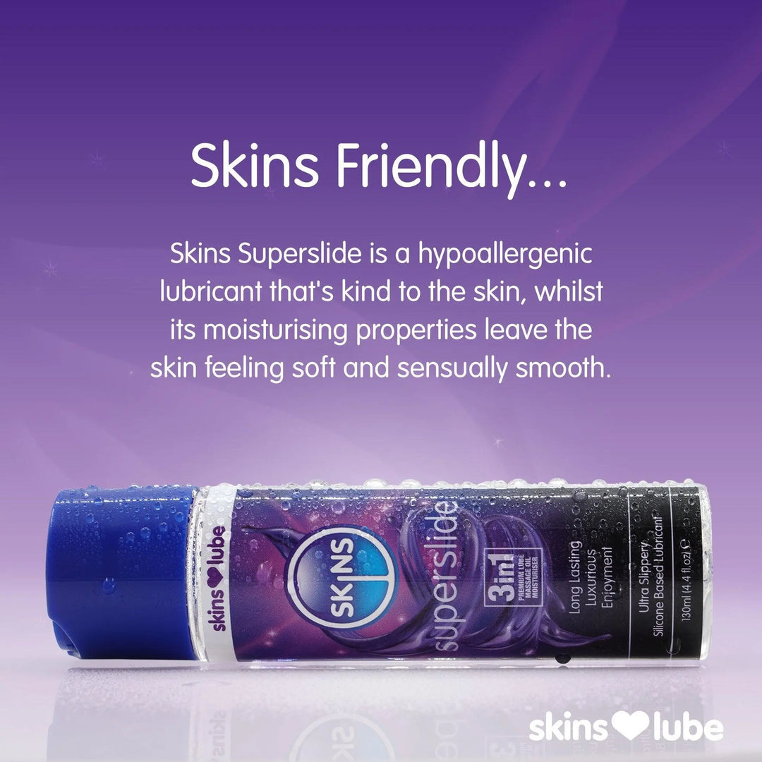 A purple gradient background with a Skins Superslide lube laid horizontally at the bottom of the image. The lube bottle is covered in water droplets and above this is a paragraph of text explaining why the Skins Superslide lube is skin freindly